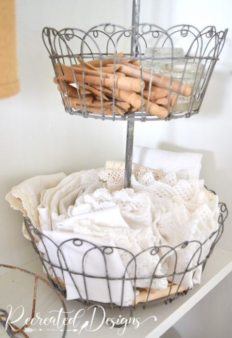 6 Ways to Use Vintage Linen in the Spaces You Love Everyday How To Display Vintage Linens, Vintage Lace Display Ideas, Antique Booth Linen Display, Repurpose Vintage Embroidered Linens, Small Vintage Rustic Fabric Metal Basket, Vintage Booth, Booth Decor, Staging Ideas, Dresser Top