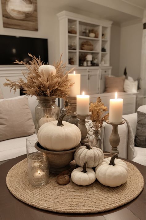 Neutral fall decor embraces earthy tones and natural textures. Think cozy beige throws, soft ivory pumpkins, rustic wooden accents, and subtle gold touches. It creates a warm, inviting atmosphere perfect for the season, blending seamlessly with any home style. #falldecor #falltabledecor #fall #falldecorations Fall Decor Ideas For The Home Aesthetic, Beige Aesthetic House Decor, Neutral Fall Home Decor Ideas, Fall Decor Ideas For The Home Neutral, Home Decor Ideas Gold Accents, Chic Fall Decor Living Room, Neutral Color Fall Decor, Earthy Tones Home Decor, Fall Decor Thanksgiving