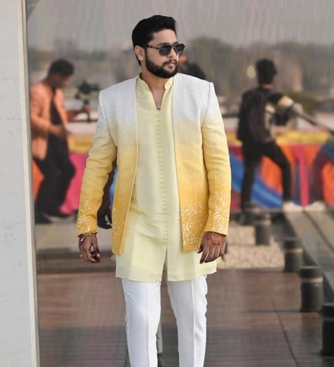 For the Haldi occasion, a men’s yellow Ombre jacket with kurta and bottom. This outfit blends traditional elements with modern aesthetics, perfect for the joyful and colourful Haldi ceremony. Groom @shivharesanyog Male Haldi Outfits, Haldi Mens Outfit, Yellow Haldi Outfit For Groom, Haldi Kurta For Groom, Haldi Outfits Men, Haldi Ceremony Outfit For Groom, Haldi Ceremony Groom, Men Haldi Outfit, Haldi Kurta For Men