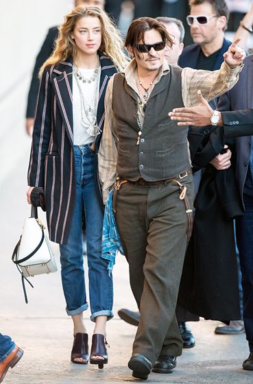 Johnny Depp -- in a vest and matching pants -- was accompanied by Amber Heard to a taping of Jimmy Kimmel Live on Jan. 15. Amber Heard Johnny Depp, Johnny Depp Style, Johnny Depp And Amber, The Danish Girl, Stylish Couple, Celebrity Sightings, Amber Heard, Roger Vivier, Celebrity Street Style