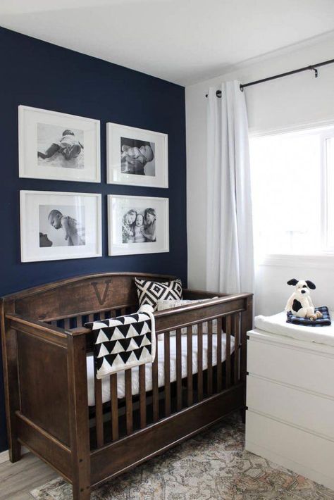 Beautiful ideas for a small nursery! This tiny baby room is off to the side of the master bedroom. Love the simple decor, from the navy wall to the brown crib and the beautiful gallery wall! #decoratingbedrooms Brown Crib, Small Baby Room, Trendy Nursery, Small Nursery, Navy Walls, Small Nurseries, Boys Crib, Child Room