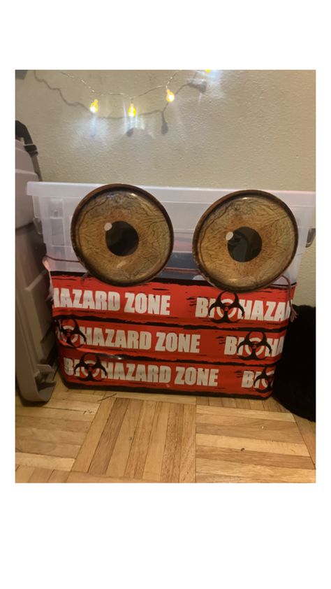 How to make. A random box doesn’t matter., any kind of design you want I chose a biohazard strip, but you gotta hurry up and get it because Halloween is coming, some big eyes to make it look like it’s a monster. Those are all the steps. Halloween Is Coming, Random Box, Big Eyes, Choose Me, I Want You, Laundry Basket, Get It, Make It, Matter