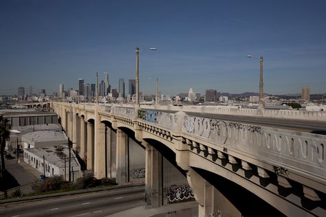 Sixth Street Viaduct from the east side of the Los Angeles River. Construction to replace the decaying bridge is expected to begin in late 2014 I Photo by Sterling Davis Bridge Photos, Los Angeles River, California Architecture, Boyle Heights, A Streetcar Named Desire, East La, East Los Angeles, Bridge Photography, San Diego Houses