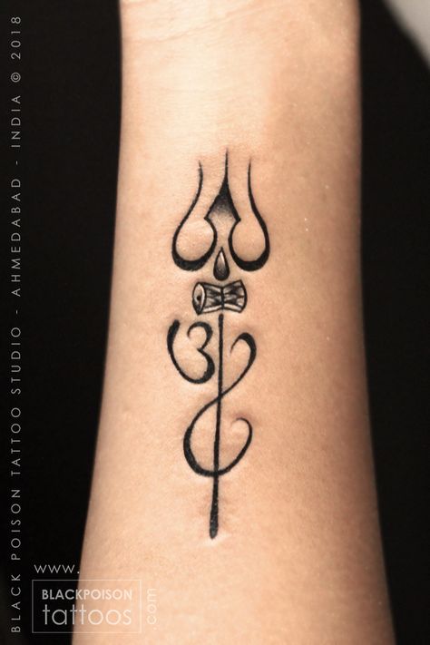 trishul tattoo, om tattoo #omtattoo #religioustattoo #trishultattoo #damrutattoo #tattoos #tattoo #tattooartist #tattooing #tattooist #shiv #shivatattoo #lordshivatattoo #blackpoisontattoos #om #tattoostudio #smalltattoo #wristtattoo Thrisul Tattoo Ideas, Mahakal Tattoo For Women, Shiva Related Tattoo, Trisula Tattoo Design On Hand, Vertical Rib Tattoo Men, Shiv Trishul Tattoo, Shiv Tattoo For Men, Shiva Tattoo Design For Men, Shiv Tattoos