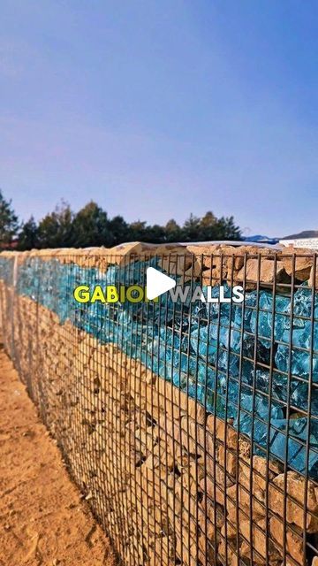 ZebraScapes Landscaping on Instagram: "GLASS GABION WALLS | COOL GABION WALL DESIGN | #gabionwalls #glasswalls #landscapingdesign #sedona #pheonix #prescott #prescottvalley @azluxuryhomegroup @luxurylivinghomesaz @luxuryprescott" Gabion Wall Design, Gabion Walls, Gabion Stone, Gabion Retaining Wall, Gabion Fence, Water Feature Wall, Gabion Wall, Bathroom Design Layout, Retaining Wall