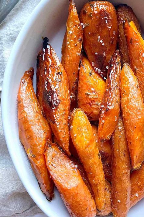 Easy Maple Glazed Roasted Carrots Maple Syrup Roasted Carrots, Roasted Carrots For Thanksgiving, Maple Glazed Carrots Roasted, Maple Glazed Roasted Carrots, Glazed Carrots Thanksgiving, Maple Roasted Carrots Oven, Roasted Maple Carrots, Maple Bacon Carrots, Maple Carrots Glazed