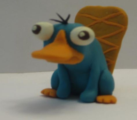 Clay Perry The Platypus, Polymer Clay Cartoon Characters, Perry The Platypus Clay, Clay Cartoon Characters, Futurama Poster, Clay Date, Easy Clay Sculptures, Perry The Platypus, Phineas Y Ferb