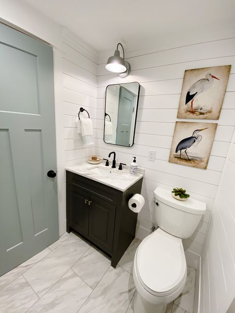 Renovated lake house bathroom using shiplap and hidden panel to hide utilities Lakehouse Bathroom Decor, Small Lake House Bathroom Ideas, Small Lake House Bathroom, Lake House Half Bathroom, Lake House Bathroom Ideas Small Spaces, Lake House Remodel Ideas, Lake Cottage Interiors Decorating Ideas, Lake Cabin Remodel, Lake Cabin Bathroom