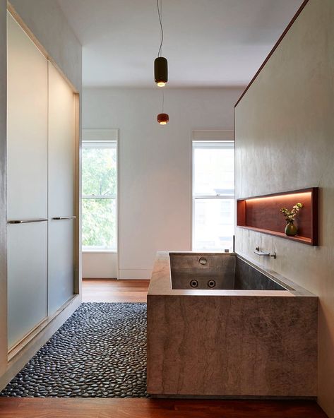 Delson or Sherman Architects on Instagram: “For this serene bathroom, we inlaid a riverstone floor between a walk-in shower and a stainless steel-lined custom tub. The tub is wrapped…” Riverstone Shower Floor, Wall Drapes, Serene Bathroom, Oak Stairs, Stone Stairs, Park Slope, Stone Bench, Garden Steps, Glass Railing