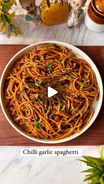 Divya on Instagram: "Chilli garlic spaghetti 🍝😍
Save this for later ❤️

Ingredients- 
1. Oil - 1 tbsp 
2. Garlic - 1 tbsp 
3. Chilli flakes - 1 tsp 
4. Oregano - 1 tsp 
5. Onion- 1 
6. Red chilli sauce- 1 tbsp 
7. Schezwan sauce- 1 tbsp 
8. Soya sauce- 1 tsp 
9. Pasta water- 1/4 cup 
10. Salt - 1 /2 tsp 
11. Spaghetti 
12. Coriander leaves 

Do try this recipe and let me know if you liked it or not . 

Follow 
For more such amazing content 

❌NO REPOST ❌

[Easy recipe, pasta recipe, chilli garlic spaghetti, snacks recipe, Quick recipe, Ranchi blogger, recipe creator, cooking video] 

#reelkarofeelkaro #reelinstagram #spaghetti #easyrecipes #ranchiblogger #ranching #cookingdiaryathome #pasta #snacktime" Chilli Spaghetti Recipes, Easy Chilli, Garlic Spaghetti, Schezwan Sauce, Recipe Pasta, Pasta Water, Soya Sauce, Coriander Leaves, Chilli Sauce