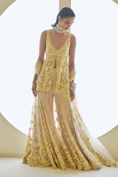 Buy Yellow Net Embroidery Sequins Deep V Flower Peplum Tunic Sharara Set For Women by Seema Gujral Online at Aza Fashions. Sangeet Board, Floral Sharara, Mirror Lehenga, Seema Gujral, Haldi Outfits, Haldi Outfit, Net Embroidery, Heavy Dresses, Sharara Suits