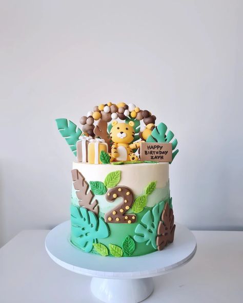 Roaring into toddlerhood with this jungle theme masterpiece! 🌿 Safari vibes make this cake as special as the little birthday boy 💚🐅 {Safaricake} #yearoftiger #safarithemecake #safarifun #safariparty #tigertheme #twoyearsold #jungleoffun #jungleparty #junglepartyvibes #tigerbirthday #tarneit #truganina #mambourin #rockbank #mtatkinson #carolinesprings #taylorslake #pointcookmums #pointcookcakes #pointcook #sanctuarylakes Jungle Theme Birthday Party Cakes, Jungle Theme Cake, Jungle Theme Cakes, Jungle Theme Birthday Party, Tiger Birthday, Jungle Theme Birthday, Jungle Party, Theme Birthday Party, Safari Party