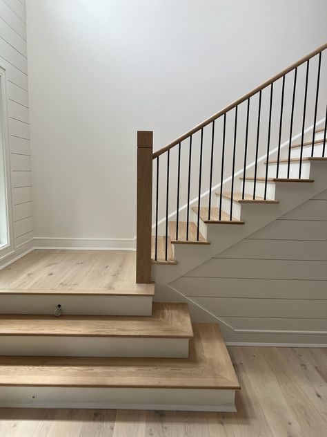 Another finished project! We love how this white oak and painted wood staircase turned out! This contemporary staircase is a gorgeous addition to this home. It uses a mixture of white oak, painted wood and iron stair parts. It also features a custom square wooden newel post with a decorative groove added. Interested in a similar style staircase for your home? Follow the link below to learn what stair parts were used. Oak Handrail, Stair Posts, Staircase Landing, White Staircase, Painted Staircases, Wood Handrail, Contemporary Staircase, Staircase Handrail, Oak Stairs