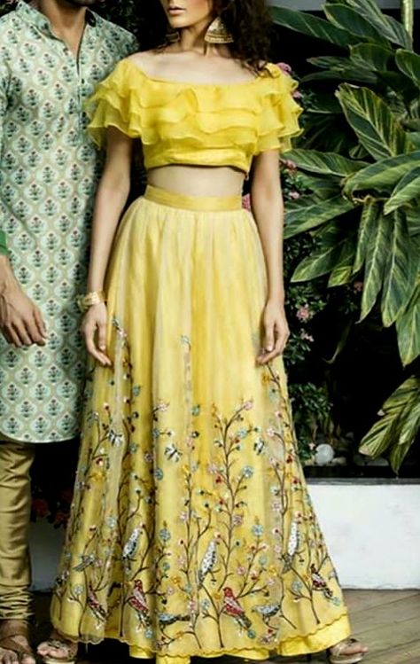 Beautiful Silk Embroidered Lehenga with ruffled blouse.  Stylish and modern silhouettes. Ruffel Sarees, Ruffle Blouse Designs, Mehndi Outfit, Lehenga Design, Lehnga Dress, Lehenga Blouse Designs, Statement Blouse, Wedding Skirt, Long Dress Design