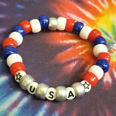 Hand Crafted Jewelry | Beaded Red White Blue Usa Kandi Bracelet | Color: Blue/Red/White | Size: Os 🌟 #EDCKnifeBeads #KnifeAccessories #EverydayCarry #EDC #GearCustomization #TacticalBeads #ParacordBeads #HandcraftedBeads #ArtisanBeads #KnifeCollecting #KnifeEnthusiast #GearUpgrade #UniqueBeads #FunctionalArt 4th Of July Bracelets, Rave Bracelets, Bracelets Hippie, Patriotic America, Red Jasper Bracelet, Diy Kandi Bracelets, Letter Bead Bracelets, Pony Bead Bracelets, Electric Daisy