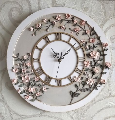 Wall clock in pale pink and gray with 3D pink sakura. The dial is painted with golden paint. Sakura branches and arrows are slightly tinted with golden paint.
The clock is made of plywood, painted with acrylic paint.The flowers are made of decorative paste in the technique of volumetric painting with a palette knife. Pink Grey Wall, Grey Wall Clocks, White Wall Clocks, Flower Clock, Handmade Wall Clocks, Arte Folk, Handmade Clocks, Pink Sakura, Gray Wall