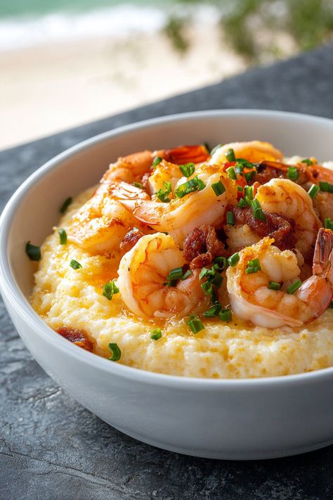 Quick Cajun shrimp and grits are just minutes away! This easy recipe delivers bold flavors and creamy grits for a comforting meal. Grits Eggs And Bacon, Shrimp Grits Recipe New Orleans, Shrimp And Sweet Potato Recipe, Grits Meals, Sausage And Grits Recipe, Shrimp And Grits Recipe New Orleans, Grits And Eggs, Shrimp Grits Recipe, Cajun Shrimp And Grits