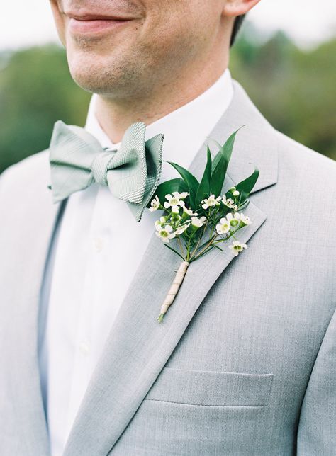 Grey suit and green and white boutonnière | Photography: Natalie Watson Photography Wedding Suits Men Grey, Groomsmen Grey, Grey Suit Wedding, Groom Bowtie, Green Bow Tie, Groom Ties, Wedding Suits Groom, Boutonniere Wedding, Gray Weddings