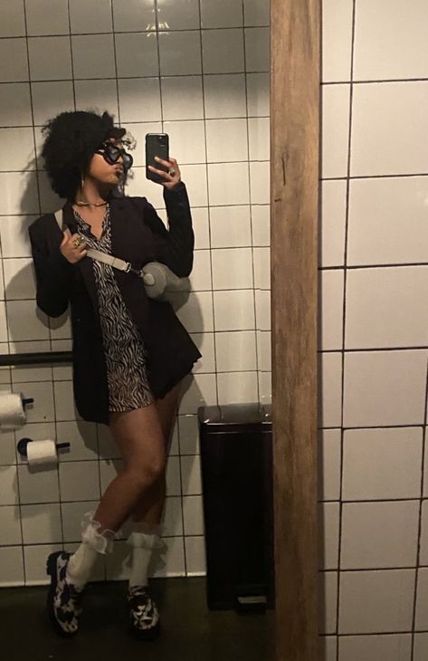 Natural hair black woman wearing an oversized button up with a blazer dress and cowprint loafers. Mocassin Outfit, Loafers Outfit, 2025 Fashion, Fashion Forecasting, Hair Black, Blazer Dress, Cow Print, Natural Hair, Black Hair