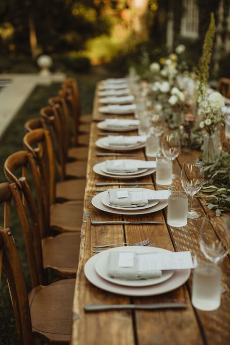 blush and grey wedding table with long wooden tables and garland. Grey Wedding Table, Reception Food Ideas, Wedding Reception Food Ideas, Wedding Plate Setting, Farm Table Decor, Blush And Grey Wedding, Dinner Centerpieces, Simple Table Settings, Gathering Table