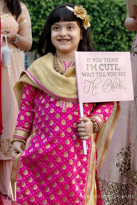 Photo of Bridal entry idea with niece holding cute board Bridal Entry, Bride Entry, Delhi Wedding, Wedding Planning Decor, Wedding Photoshoot Poses, Wedding Design Decoration, Wedding Photo Props, Indian Wedding Planning, Wedding Planning Websites