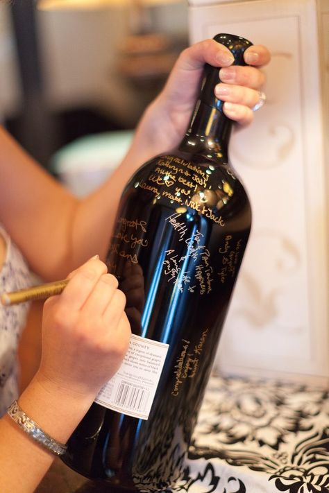 In lieu of a guest book, the couple had guests sign a magnum bottle of wine that they would share on their anniversary. Wine Bottle Guest Book, Batchlorette Party, Bachelorette Party Checklist, Wedding Guest Sign, Wedding Guest Signing, Wine Bottle Centerpieces, Bottle Centerpieces, Awesome Bachelorette Party, Bridesmaid Duties