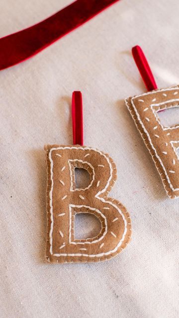 Geneva Vanderzeil on Instagram: "Making embroidered felt letter ornaments! With 6 weekends left before Christmas, now is the perfect time to start making handmade gifts and decor you’ve been dreaming about! If you want to do something simple that won’t take much time, these letter ornaments are perfect! We have the full tutorial for this in my embroidery course @genevasdiyschool along with lots of Christmas embroidery designs and other embroidered projects to inspire you. Who else is so excited for a handmade Christmas?! #christmas #feltornaments #embroideredornaments #diy #handmadechristmas" Felt Initial Ornament Diy, Diy Felt Letter Ornaments, Felt Letter Ornaments Diy, Diy Felt Letters, Felt Letters Diy, Felt Letter Ornaments, Embroidered Projects, Dollhouse Renovation, New Dining Table