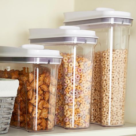 Keep your cereal fresher longer! Our BPA Free Good Grips POP Cereal Dispensers by OXO offer two airtight seals to keep cereal at its freshest, and their tapered design makes holding and pouring easy. Just push down on the back of the lid to open and push down at the front to close. Their rectangular shape maximizes space-efficiency in the pantry or on the counter. Off to college this fall? This is a perfect food storage container for your dorm room. Oxo Containers, Desain Pantry, Cereal Containers, Cereal Dispenser, Kitchen Organization Pantry, The Home Edit, The Container Store, Kitchen Cabinet Organization, Glass Food Storage