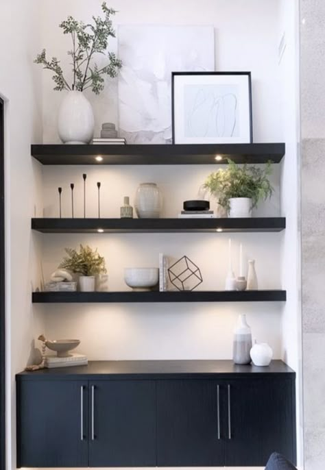 Black Floating Shelves Dining Room, Black Shelves Decor Living Room, Modern Office Shelf Decor, Styling Living Room Floating Shelves, Decorate Large Shelves, Top Shelves Decor, Modern Dining Room Shelves, White Walls Black Shelves, Simple Modern Shelf Decor