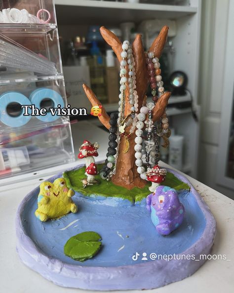 Not my usual content but here we are 🥰 A little something about me: i love creating things with my hands 💕 air dry clay is all over my fyp so i got inspired to make my own jewelry holder. I had so much fun making this little cottagecore themed trinket 🥰 #airdryclay #claytrinketdish #handmade #jewelryholder Dry Clay Jewelry Holder, Jewelry Trinket, Airdryclay Ideas Jewelry Holder, Air Clay Jewelry Holder, Clay Jewelry Stand, Air Dry Clay Bracelet Holder, Jewelry Clay Holder, Clay Jewelry Holder Necklaces, Clay Jewelry Holder Diy