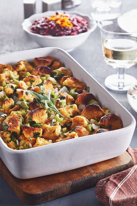 For a delicious French spin on the classic American stuffing, turn to the buttery richness of brioche bread. Don't worry — while we went to France with the bread, this still has all the flavors of traditional stuffing. Brioche Dressing, Bacon Stuffing, Cauliflower Stuffing, Gluten Free Stuffing, Savory Sides, Brioche Bread, Thanksgiving Dishes, Holiday Meal, Stuffing Recipes