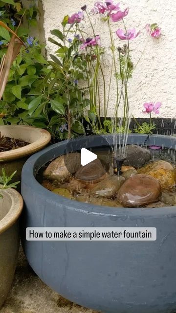 Plants | Decor | Inspiration on Instagram: "I love water in the garden , but water fountains can be very expensive to buy, so this is a simple way to add a bit of magic to our garden or balcony 💜  🎥 @gunnaydri  Make sure to use a large pot so the water doesn’t spill out, the little solar water pump can be bought on Amazon and has many different attachments to create different looks 💜  I bought one that has a built in battery, it can store a bit of energy when it is not sunny 💜  It stops at night and is very easy to set up💜  I will be making a few water fountains for our little garden and I will try to add waterlilies and other pond plants to them💜   Large pots can be expensive, but I managed to get some at a  discount furniture store💜  Enjoy  #waldorfhomeschool #naturalchildhood #ma Simple Water Fountains Outdoor, Flower Pot With Solar Fountain, Garden Fontaine, Plant Pot Pond, Small Water Feature Ideas, Flower Pot Fountain Diy Solar, Diy Pond In A Pot, Plant Pot Water Feature, Pot Water Fountain