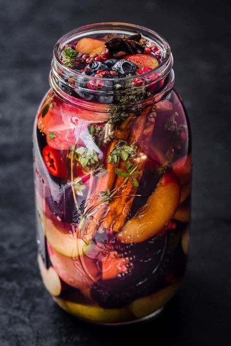 Hold on to summer just a teeny tiny bit longer by putting some of the seasons best fresh fruit bounty in jar and pickling it! #pickledfruit #pickledpeaches #pickledblueberries #pickledplums #pickledmixedfruit Pickled Peaches, Pickled Fruit, Pickled Cherries, Making Sauerkraut, Fermentation Recipes, Pickled Veggies, Bread Appetizers, Pickled Vegetables, Pickle Jars