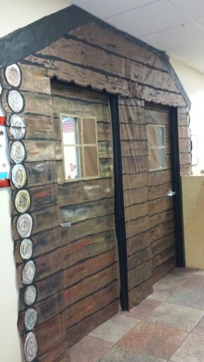 Little House in the Big Woods  log cabin classroom doors Log Cabin Classroom Door, Pioneer Classroom Transformation, Arctic Vbs, Camp Vbs, Cabin Theme, Camping Classroom, Sunday School Rooms, Camping Theme Classroom, Cabin Doors