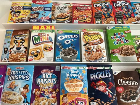 The wall at Pop Cereal Café in Porto, Portugal is lined with all kinds of cereal. There are boxes of Kellogg's Coco Pops, Choco Krispies, Crunchy Nut Chocolate Clusters, Crunchy Nut Peanut Butter Clusters, Peanut Butter Cap'n Crunch, Cap'n Crunch, Cinnamon Frosted Flakes, Nestle Cini Minis, Post Oreo O's, Cinnamon Pebbles, General Mills Apple Cinnamon Toast Crunch, Kellogg's Frosted Krispies, Rice Krispies Treats, Rice Krispies Multigrain Shapes, RiCiCLES, General Mills Chocolate Cheerios and mo Peanut Butter Clusters, Cereal Cafe, Coco Pops, Cap'n Crunch, Filipino Snacks, Chocolate Clusters, Chocolate Cereal, Crunch Cereal, Rice Krispies Treats