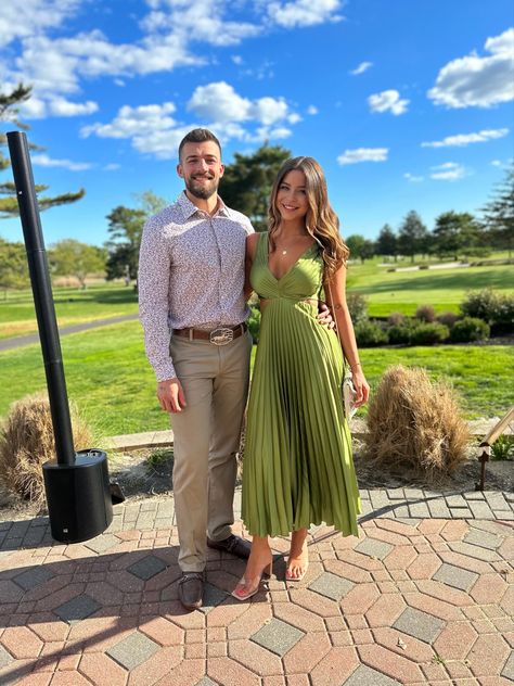 Guest Wedding Couple Outfits, Green Wedding Attire Guest, Cocktail Wedding Mens Outfit, Green Satin Dress Wedding Guest, Men’s Tropical Outfit, Wedding Guest Dress Country Club, Wedding Guest Outfit Couples, Green Dress Couple Outfit Wedding, Men’s Formal Wedding Guest