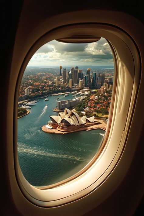 Experience the breathtaking beauty of Sydney from above with this hyper-realistic image captured through an airplane window. This striking perspective showcases the iconic landmarks and vibrant landscape of the city, offering a unique glimpse of Sydney that will inspire travel dreams. Perfect for those who appreciate stunning aerial photography, this image is a captivating addition to any collection or travel board. A must-see for anyone enchanted by the allure of beautiful cityscapes. Cool Airplane Pictures, Sydney Aesthetic City, Sydney Australia Aesthetic, Sydney Aesthetic, Beautiful Cityscapes, Airplane Window View, Vibrant Landscape, Plane Window, Moving To Australia