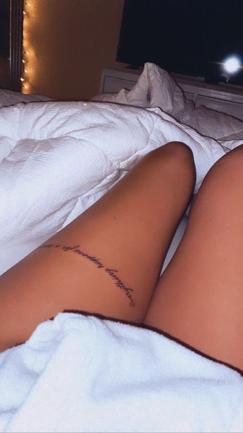 Tattoos For Women Everything Happens For A Reason, Tattoo Ideas Female Everything Happens For A Reason, Leg Phrase Tattoo, Womens Tattoo Quotes, Writing Tattoo On Thigh, Thigh Wrap Around Tattoo Quote, Thigh Phrase Tattoo, Everything Happens For A Reason Tattoo On Thigh, Leg Script Tattoos Women