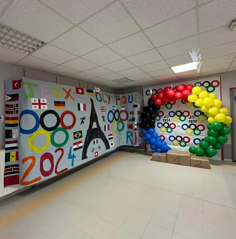 Olympic Podium Diy For Kids, Office Olympics Decorations, Olympics Balloon Arch, Back To School Olympic Theme, Olympic Spirit Week Ideas, Olympic Theme Decorations, Olympic Photo Backdrop, Olympic Photo Booth, Olympic Decorations Classroom