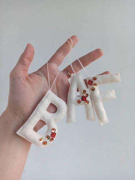 Stuffed felt letters with sequins are a fun and original way label  your Christmas tree or gifts. They can also be hung on the tree as ornaments for each family member. Letters available in red and white colors  Each letter is 3.14 (8cm) inches tall How to order: Choose the color and number of letters you want and in the note write what kind of letters it will be. For example: C - Red H - White Please contact me if you have any questions regarding color of letters and if you wish I will create a Stuffed Felt Letters, Stocking Decor, Heart Gift Tags, Red H, Letter Ornaments, Custom Stocking, Ornaments Christmas Tree, Felt Beads, Felt Letters