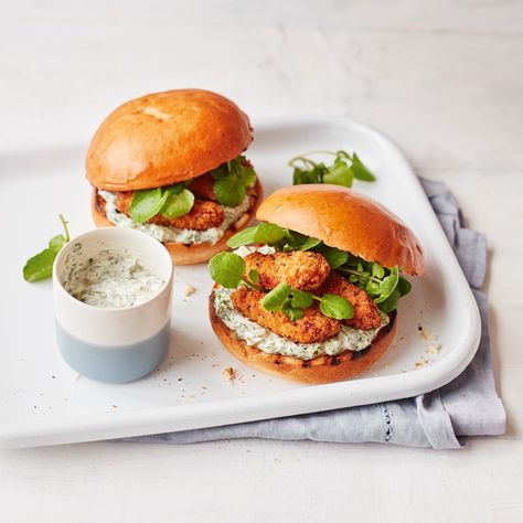 Fish Goujons with Tangy Homemade Tartare Sauce in Brioche Bun Recipe | Recipes from Ocado Fish Goujons, Tartare Sauce, Frozen Sweet Potato Fries, Brioche Bun, Steamed Fish, Salmon And Rice, Lemon Pasta, Bun Recipe, Potato Fries