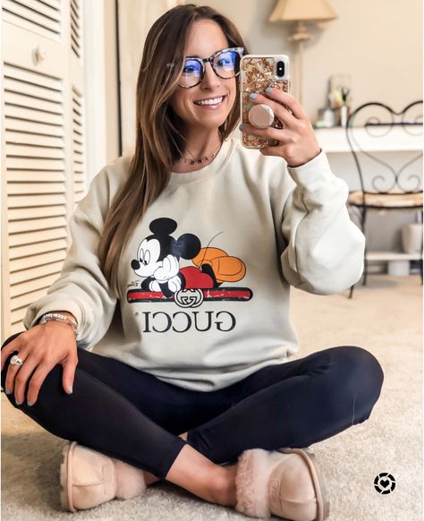 Just spending quality time with Mickey 😍 how cute is this Gucci dupe sweatshirt?! I literally could not be more obsessed. Check my LIKEtoKNOW.it for all the deets  #ootd #quarantinestyle #dupe #gucci #guccidupe #sweatshirt #sweaterweather #mickey #mickeymouse #ugg #comfystyle #comfyclothes #comfyoutfit #diff #diffeyewear #makeadifference #thesiskiss #ltkstyle #ltksalealert #LTKunder50 #LTKsalealert #LTKspring #ltkit #liketoknowit #liketkit #etsy Mickey Mouse Sweatshirt Outfit, Mickey And Co Sweatshirt, Mickey Mouse Graphic Tee With Crew Neck, Casual Mickey Mouse Crew Neck Sweatshirt, Casual Long Sleeve Mickey Mouse Sweatshirt, Mickey Mouse Crew Neck Hoodie For Streetwear, Diff Eyewear, Comfy Fashion, Quality Time