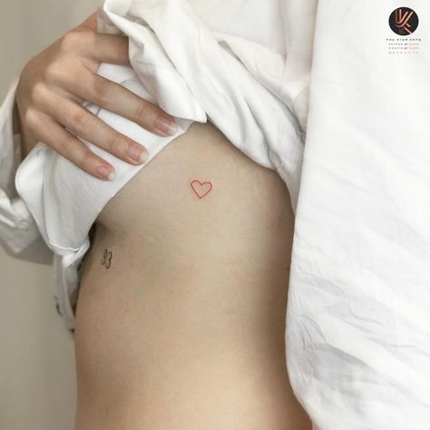 Tiny Heart Hip Tattoo, Tiny Stomach Tattoos, Tattoos Near Breast, Small Breast Tattoo, Tattoo Near Breast, Heart Sternum Tattoo, Side Breast Tattoo, Pelvic Bone Tattoo, Heart Tattoo On Chest