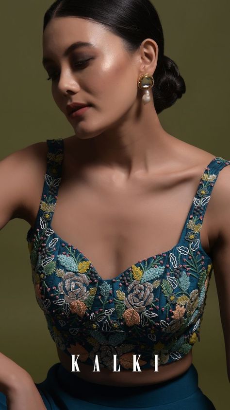 Palazzo Crop Top, Vinny Arora, Corset Neckline, Sleeveless Blouse Designs, Teal Design, Cape Outfit, Saree Jackets, Saree Blouse Styles, Flared Palazzo