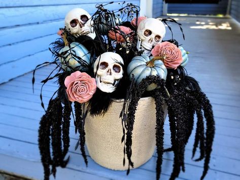 Halloween Outdoor Planter With Skulls, Pink Roses and Turquoise Pumpkins Turquoise Pumpkins, Creepy Halloween Props, Front Porch Decorating Ideas, Pastel Skull, Planters Ideas, Halloween Decorations To Make, Summer Planter, Skull Planter, Halloween Diy Outdoor