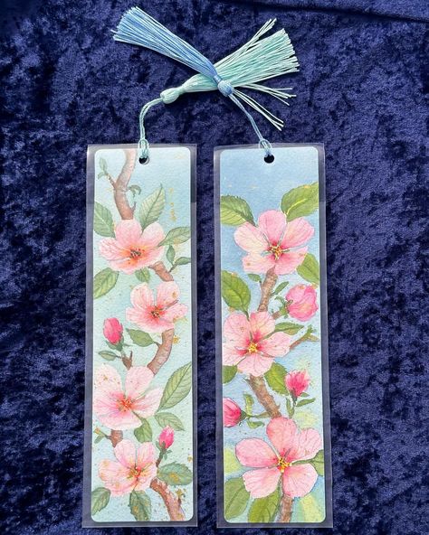 Bookmarks in love! Hand painted apple blossoms. I love to read and after 50+ years of dog earring every book in my hand I finally started using bookmarks! It’s fun to paint bookmarks because they are small and I can try out new ideas. Voila! #mariewisefineart #handpaintedbymarie #artistsoninstagram #originalart #originalartwork #watercolor #watercolorart #watercolorpainting #watercolor_zone #watercoloronpaper #watercolorartist #watercolorlove #inspiring_watercolors #aquarello #emergingart... Paint Bookmarks, Painted Apple, I Love To Read, Apple Blossoms, Love Hand, Watercolor Bookmarks, Dog Earrings, Apple Blossom, Watercolor Artist