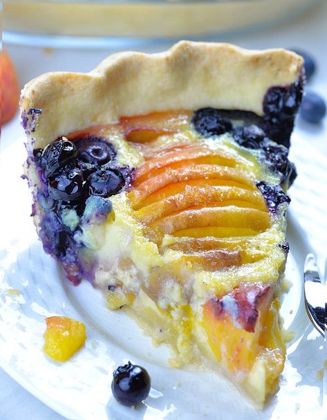 Blueberry Peach Pie on a white plate. Blueberry Peach Pie, Peach Custard Pie, Peach Custard Pies, Peach Blueberry Pie, Peach Custard, Buttery Pie Crust, Peach Blueberry, Custard Pie, Peach Pie