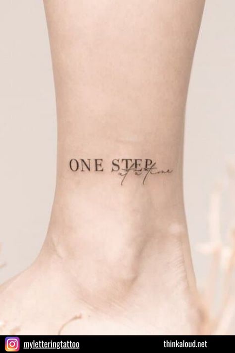 “One step at a time” is a mantra for those who believe in steady progress. This tattoo serves as a daily reminder that every small step leads to big achievements. This quote encourages you to keep moving forward, no matter how slow the progress may seem. Step Tattoo, Small Steps Tattoo, Keep Moving Tattoo, Tattoos For Moving Forward, One Step At A Time Tattoo, Tattoo One Step At A Time, Step Kids Tattoo Ideas, Tiny Steps Quotes, Small Steps Are Better Than No Steps