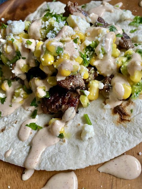 Steak Tacos with Corn Salsa - Hungry Happens Round Steak Tacos, Steak Tacos Recipes, Tacos With Corn Salsa, Spicy Crema, Tacos Recipes, Hungry Happens, Steak Tacos, Round Steak, Corn Salsa