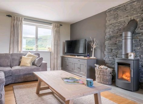 Lounge With Corner Log Burner, Cottage Living Rooms Area Rugs, Modern Living Room With Log Burner, Lounge Ideas With Log Burner, Living Room With Wood Burner, Freestanding Log Burner Living Rooms, Log Burner Feature Wall, Log Burner No Fireplace, Living Room Designs With Log Burner